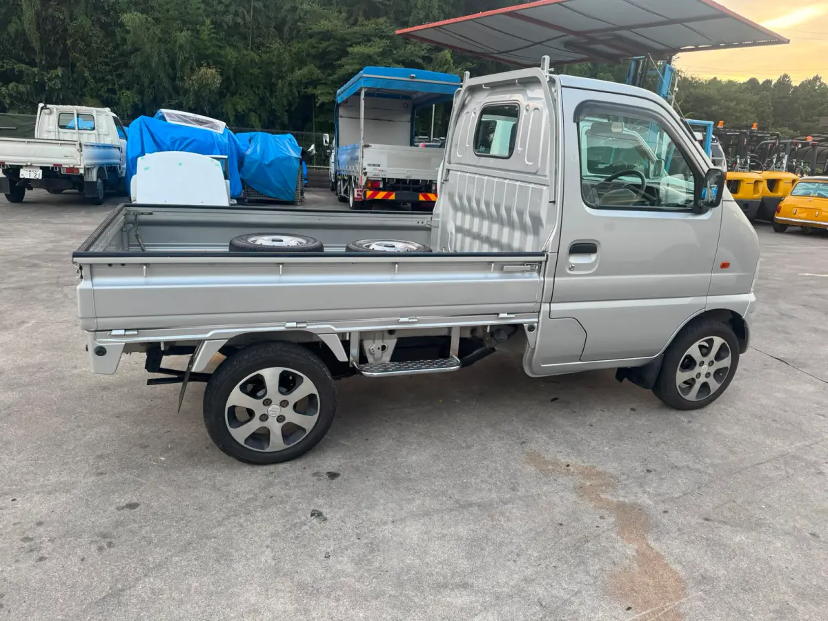 2000 Suzuki Carry 4x4, a silver Kei Truck, for sale at Skyline Kei Trucks in Houston, TX (photo 3 of 10)