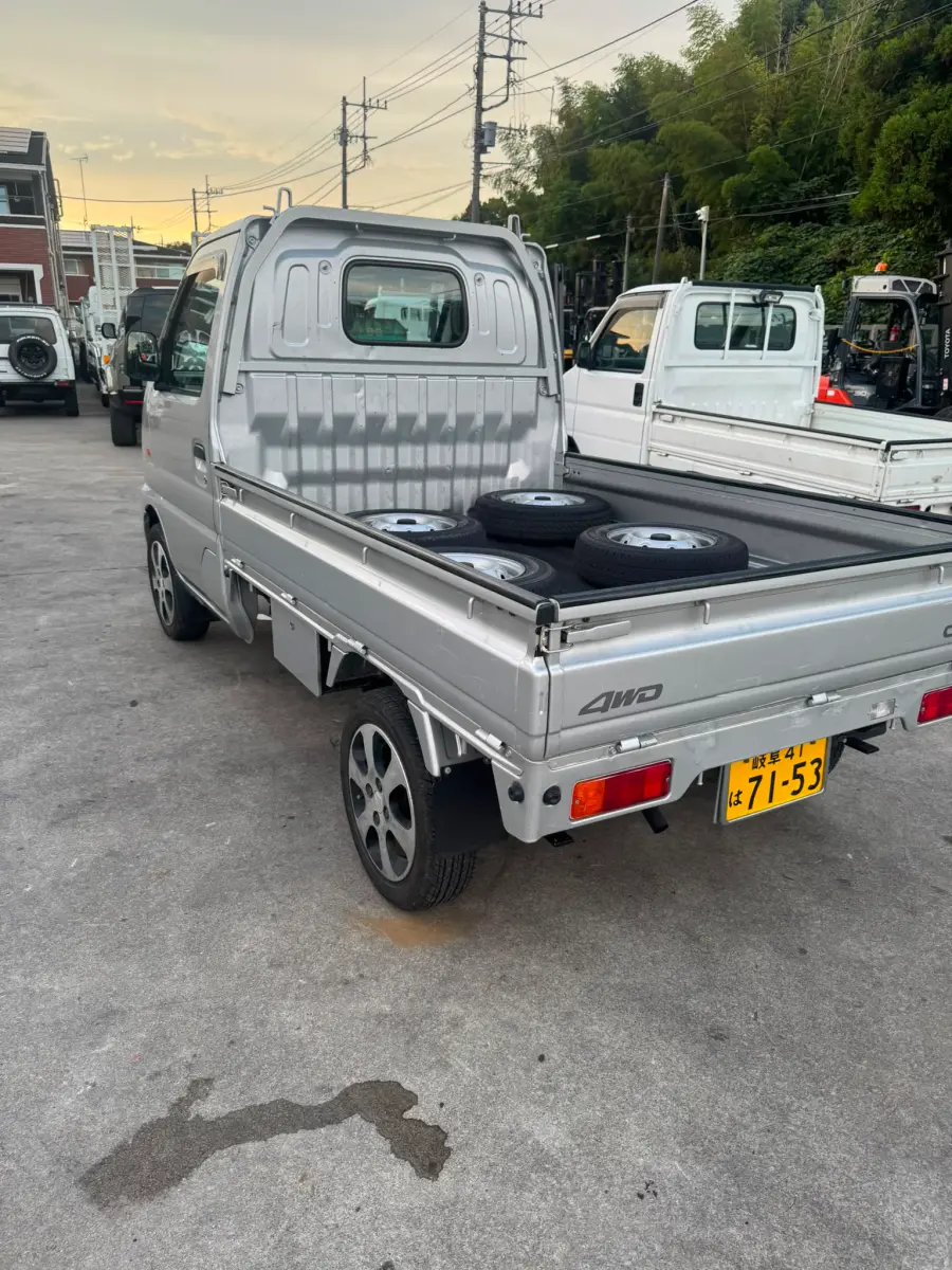 2000 Suzuki Carry 4x4, a silver Kei Truck, for sale at Skyline Kei Trucks in Houston, TX (photo 5 of 10)