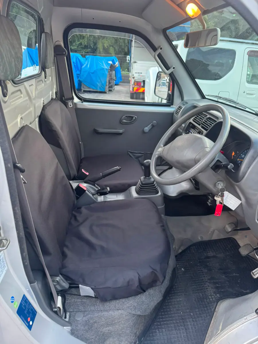 2000 Suzuki Carry 4x4, a silver Kei Truck, for sale at Skyline Kei Trucks in Houston, TX (photo 8 of 10)