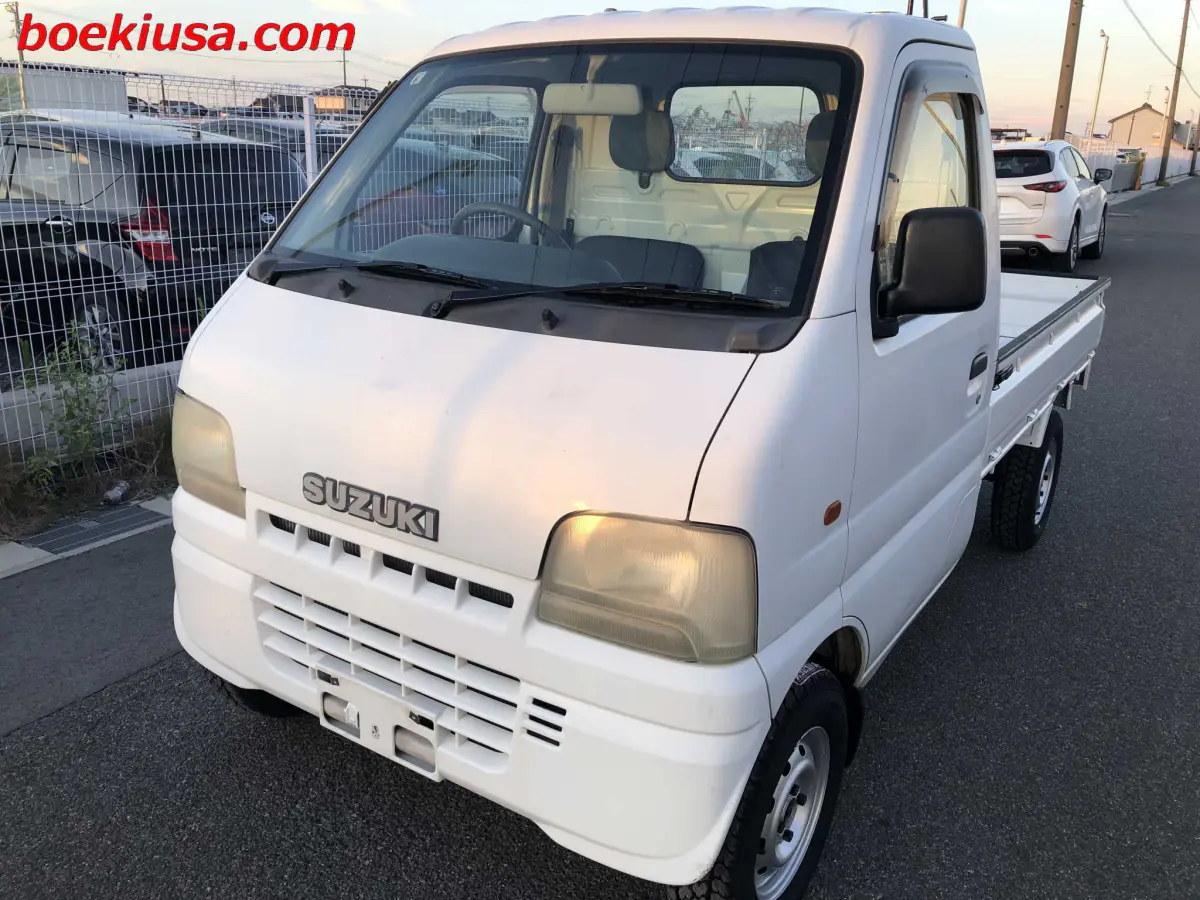 2000 Suzuki Carry 4x4, a white Kei Truck, for sale at Boeki USA in Paterson, NJ (photo 2 of 20)