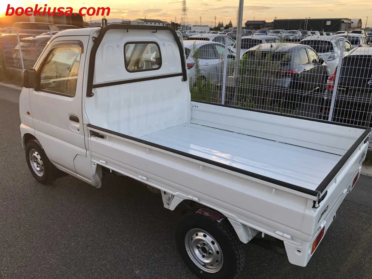 2000 Suzuki Carry 4x4, a white Kei Truck, for sale at Boeki USA in Paterson, NJ (photo 3 of 20)