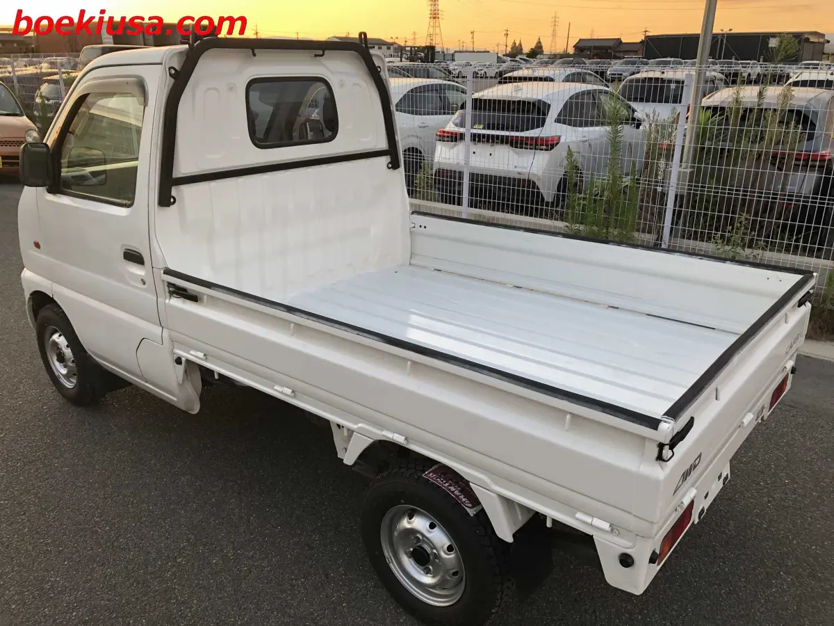 2000 Suzuki Carry 4x4, a white Kei Truck, for sale at Boeki USA in Paterson, NJ (photo 3 of 20)