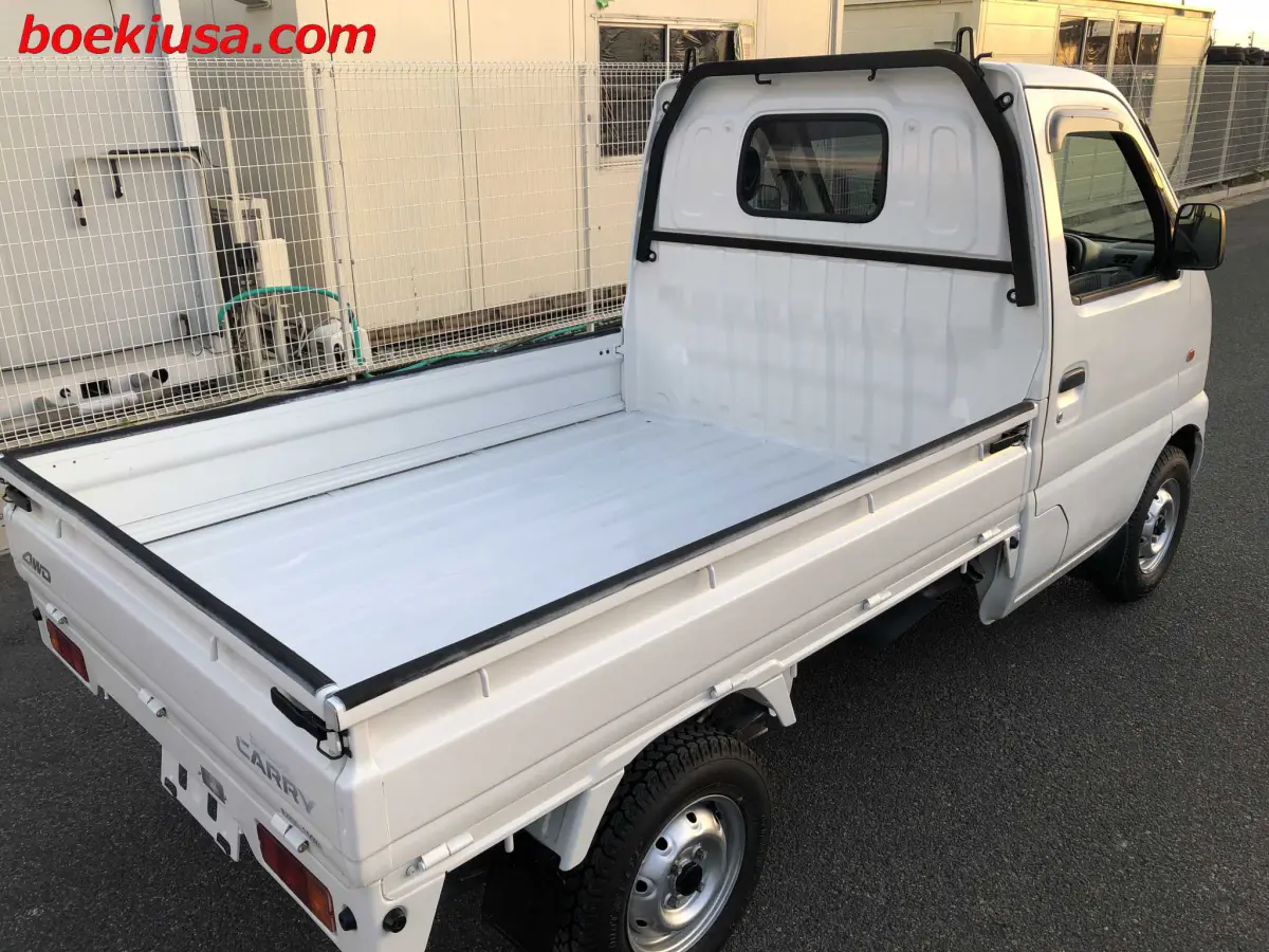 2000 Suzuki Carry 4x4, a white Kei Truck, for sale at Boeki USA in Paterson, NJ (photo 4 of 20)