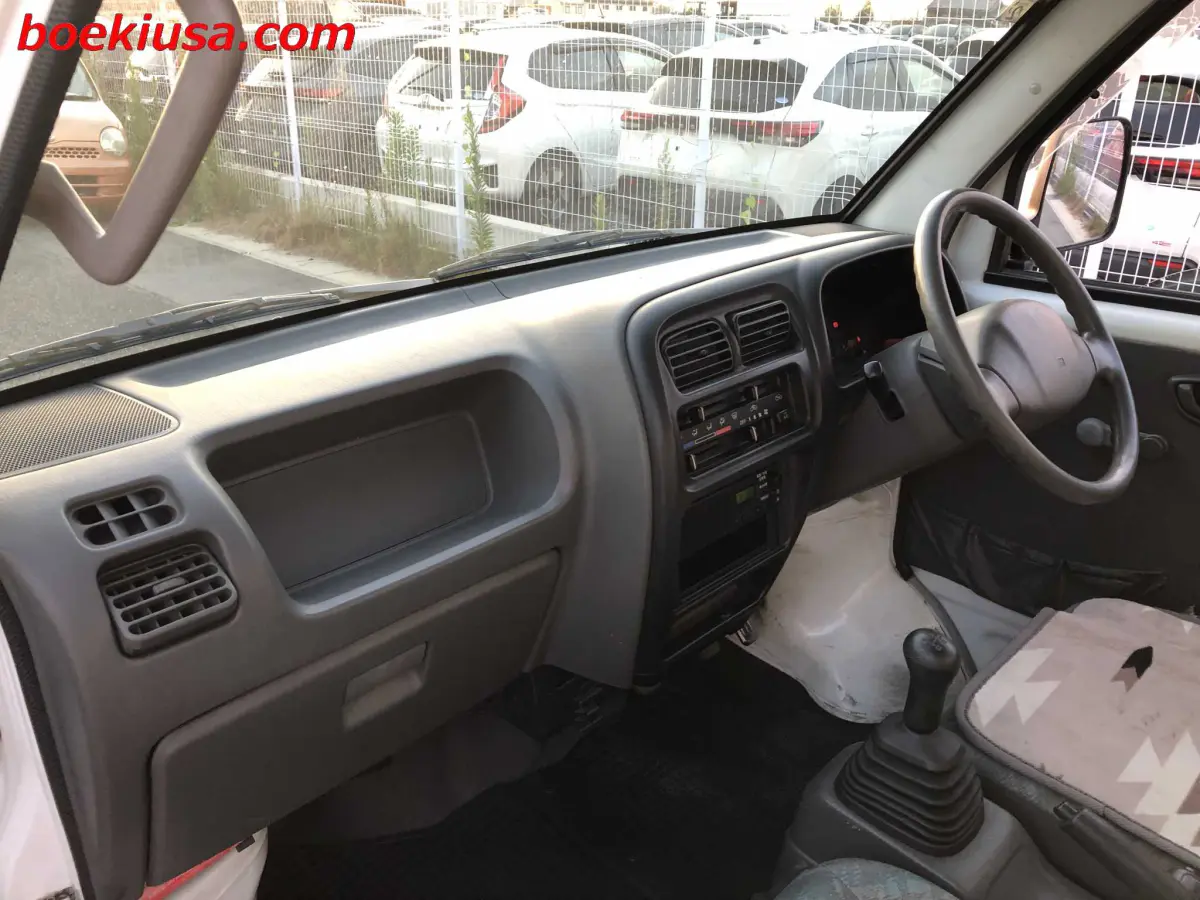 2000 Suzuki Carry 4x4, a white Kei Truck, for sale at Boeki USA in Paterson, NJ (photo 9 of 20)