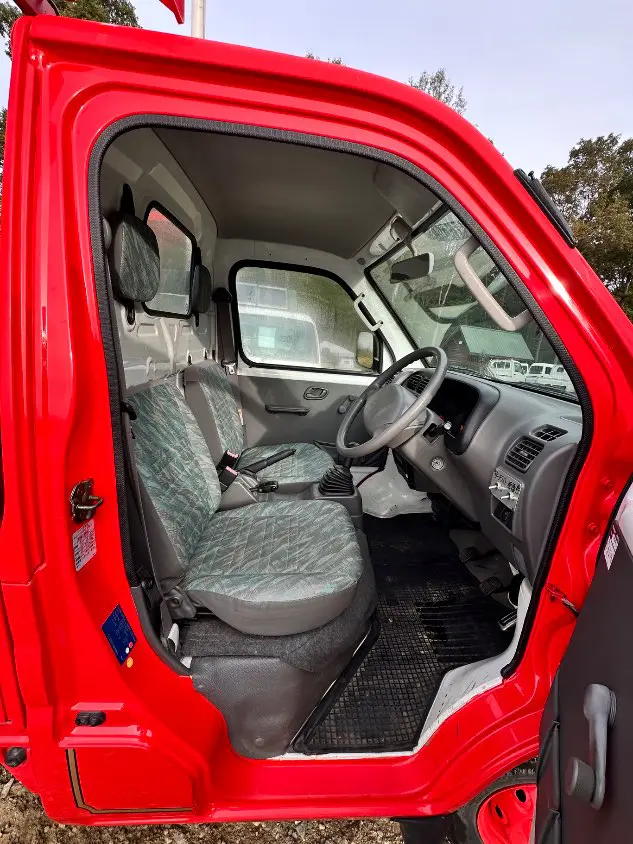 2000 Suzuki Carry Fire Truck 4WD, a red Kei Truck, for sale at Mayberry Mini Trucks in Mount Airy, NC (photo 12 of 20)