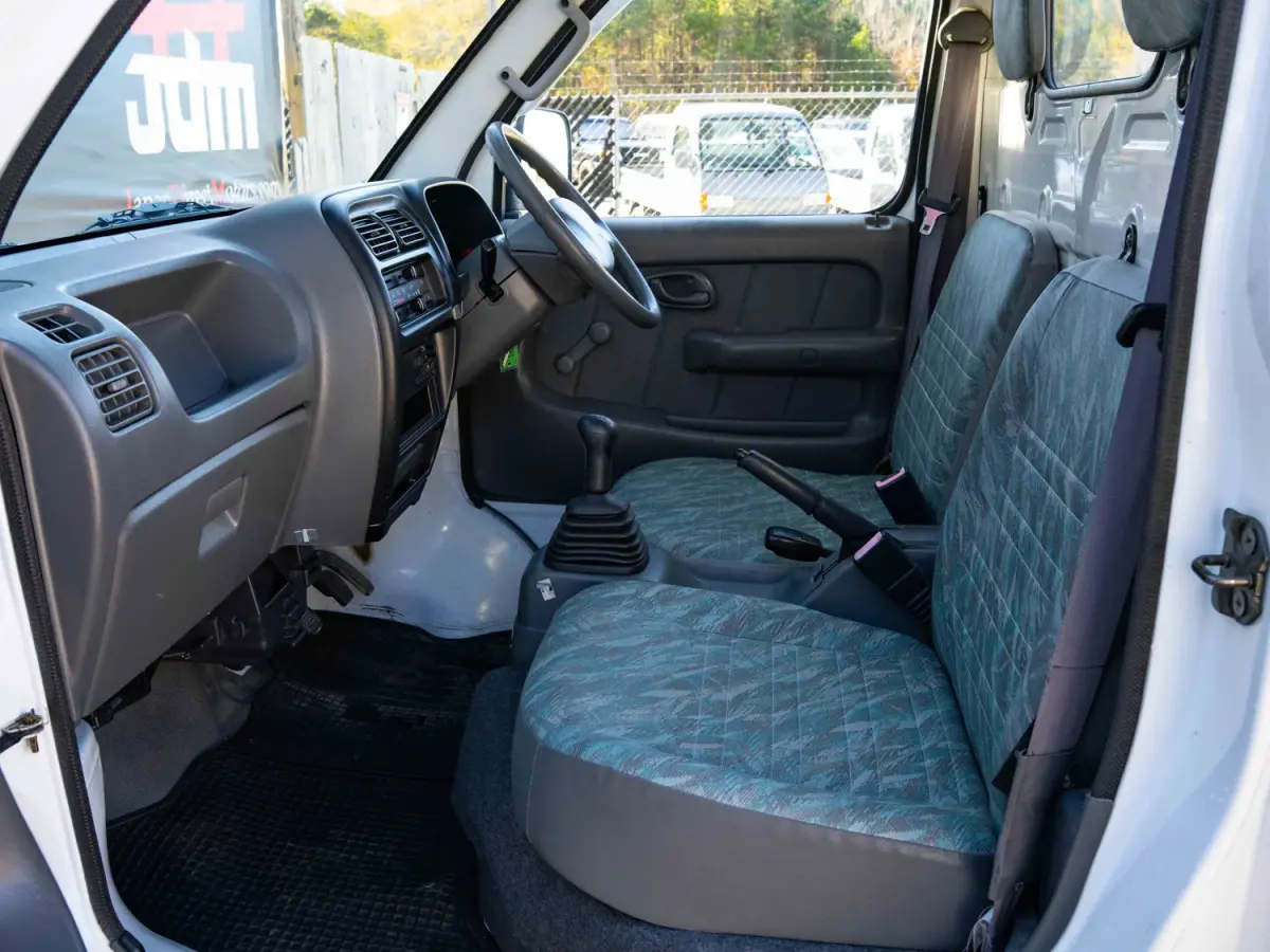 2000 Suzuki Carry, a white Kei Truck, for sale at Japan Direct Motors in Irmo, SC (photo 12 of 13)