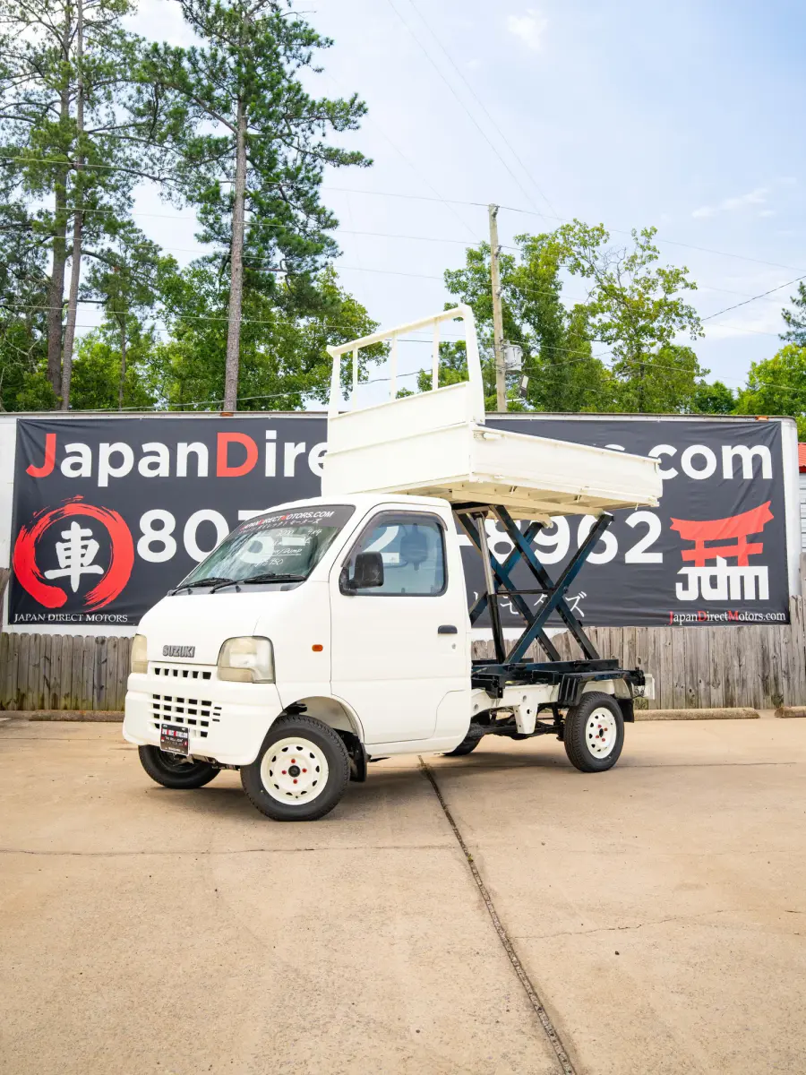 2000 Suzuki Carry Scissor / Dump Bed, a white Kei Truck, for sale at Japan Direct Motors in Irmo, SC (photo 1 of 15)