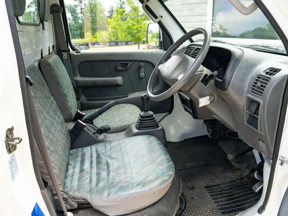 2000 Suzuki Carry Scissor / Dump Bed, a white Kei Truck, for sale at Japan Direct Motors in Irmo, SC (photo 13 of 15)