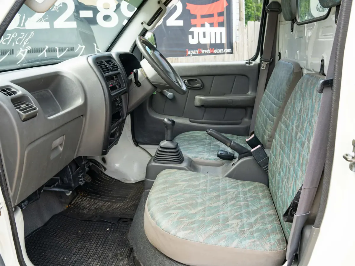 2000 Suzuki Carry Scissor / Dump Bed, a white Kei Truck, for sale at Japan Direct Motors in Irmo, SC (photo 14 of 15)