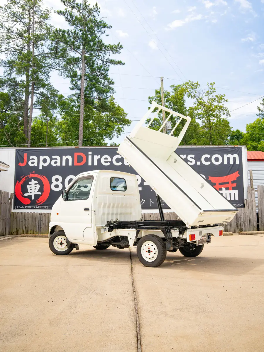 2000 Suzuki Carry Scissor / Dump Bed, a white Kei Truck, for sale at Japan Direct Motors in Irmo, SC (photo 2 of 15)