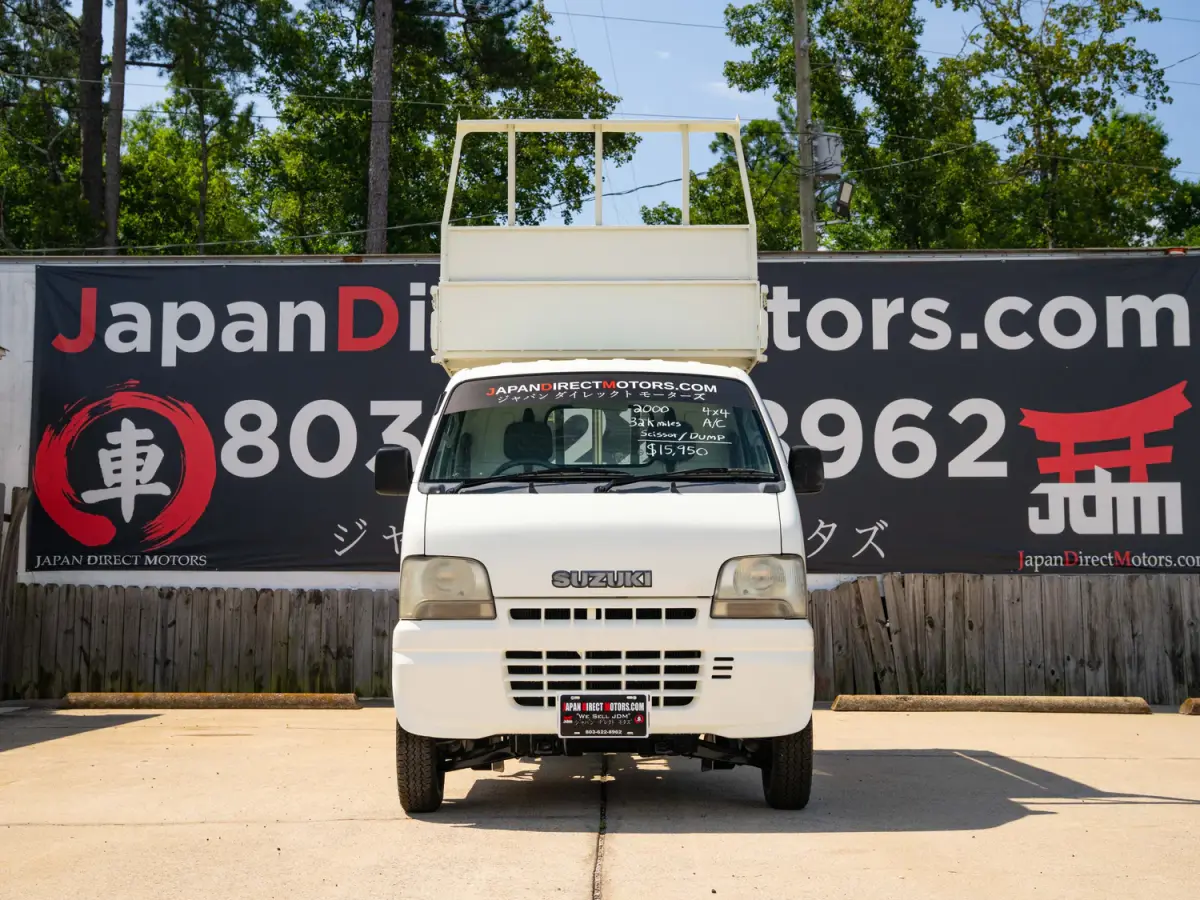 2000 Suzuki Carry Scissor / Dump Bed, a white Kei Truck, for sale at Japan Direct Motors in Irmo, SC (photo 4 of 15)