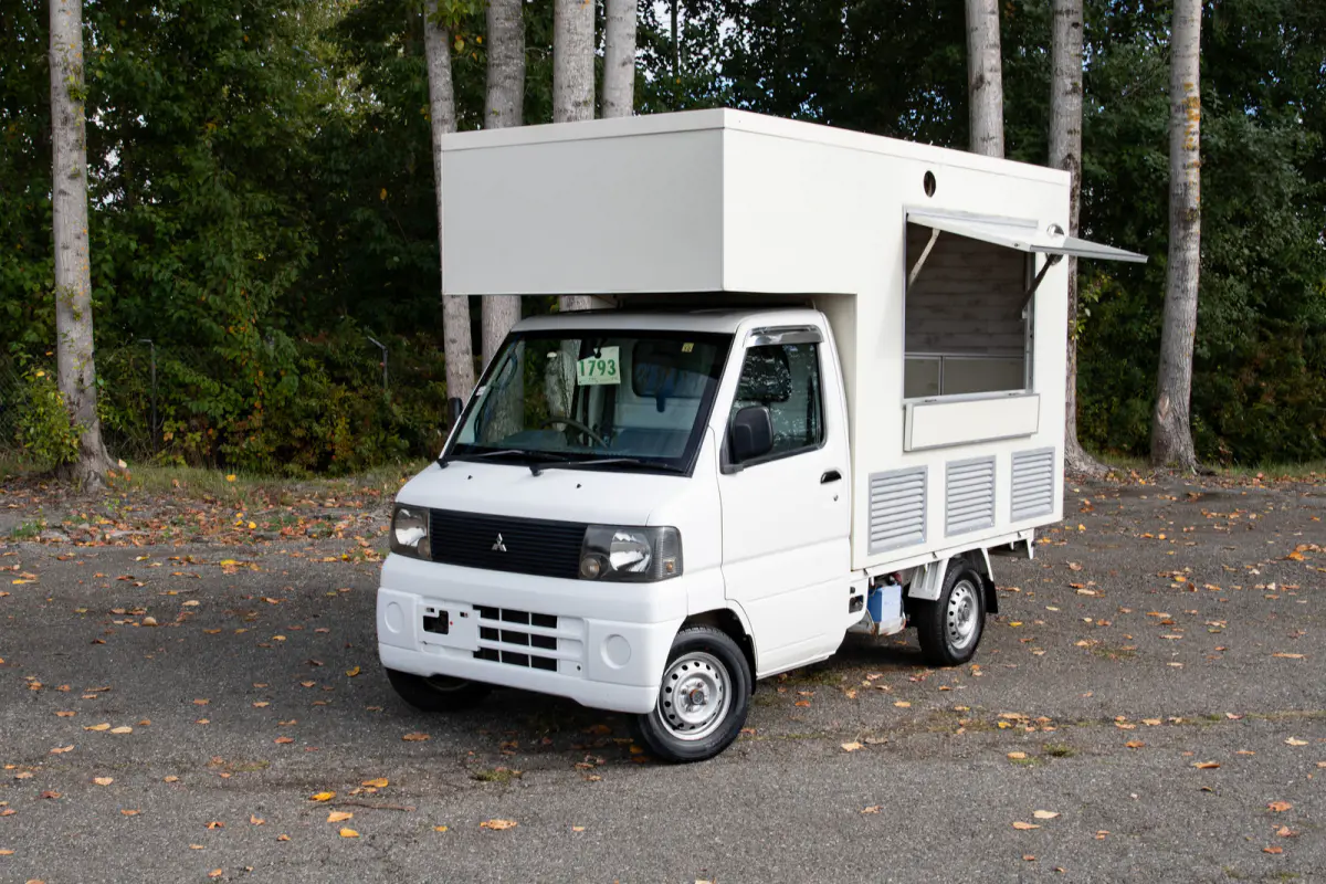 2001 Mitsubishi Minicab Food Truck, a black Kei Truck, for sale at The Import Guys in Ferndale, WA (photo 1 of 15)