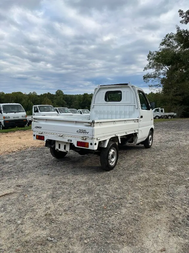 2001 Suzuki Carry 4WD, a white Kei Truck, for sale at Mayberry Mini Trucks in Mount Airy, NC (photo 7 of 20)