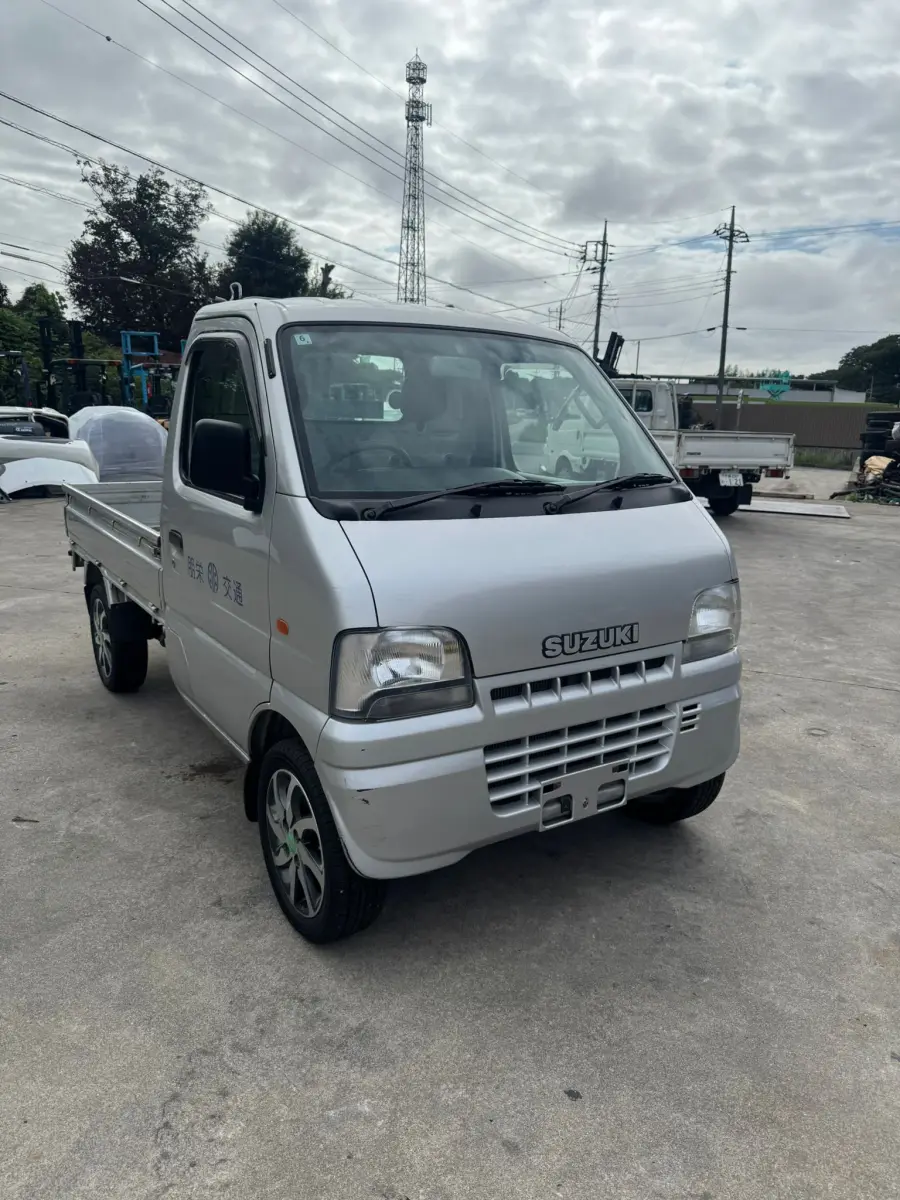 2001 Suzuki Carry 4x4, a silver Kei Truck, for sale at Skyline Kei Trucks in Houston, TX (photo 1 of 12)