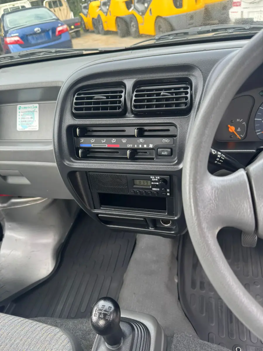 2001 Suzuki Carry 4x4, a silver Kei Truck, for sale at Skyline Kei Trucks in Houston, TX (photo 10 of 12)