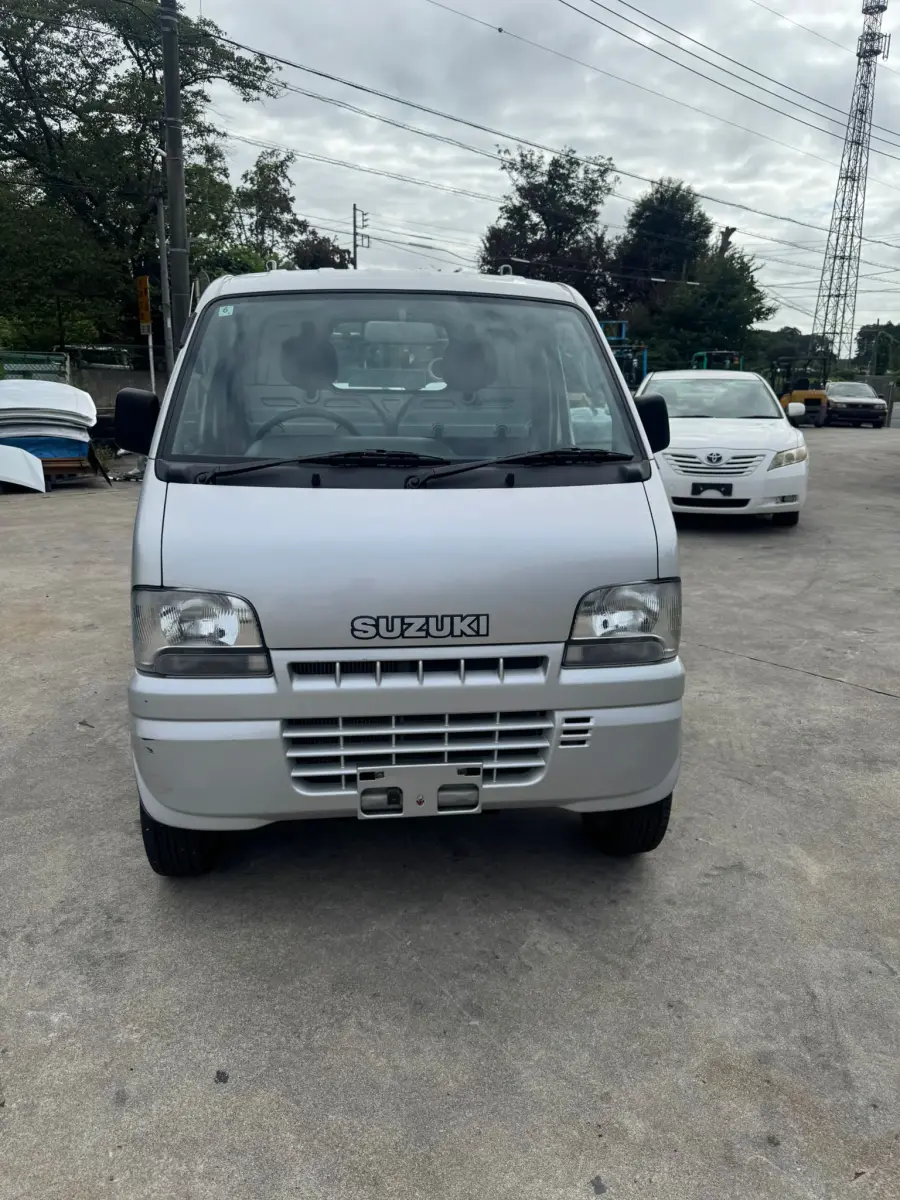 2001 Suzuki Carry 4x4, a silver Kei Truck, for sale at Skyline Kei Trucks in Houston, TX (photo 2 of 12)