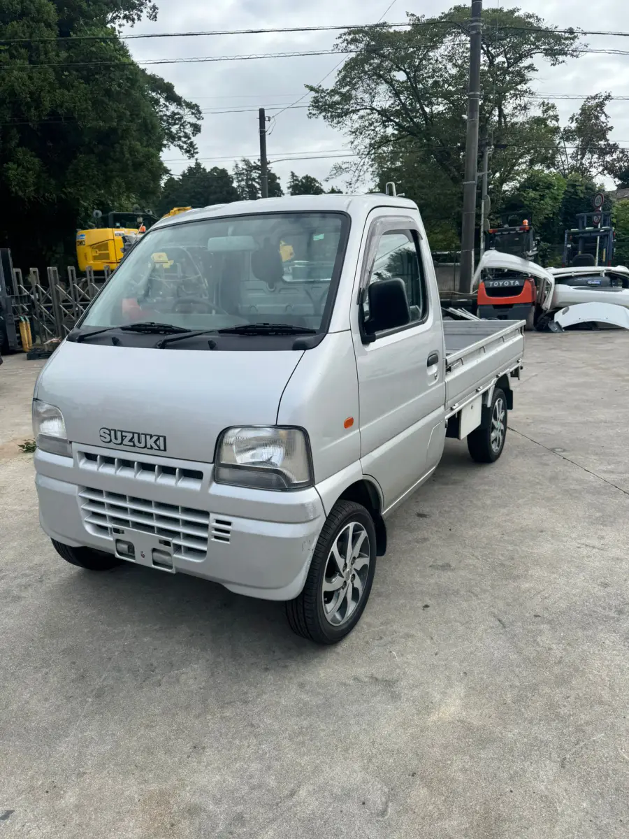 2001 Suzuki Carry 4x4, a silver Kei Truck, for sale at Skyline Kei Trucks in Houston, TX (photo 3 of 12)