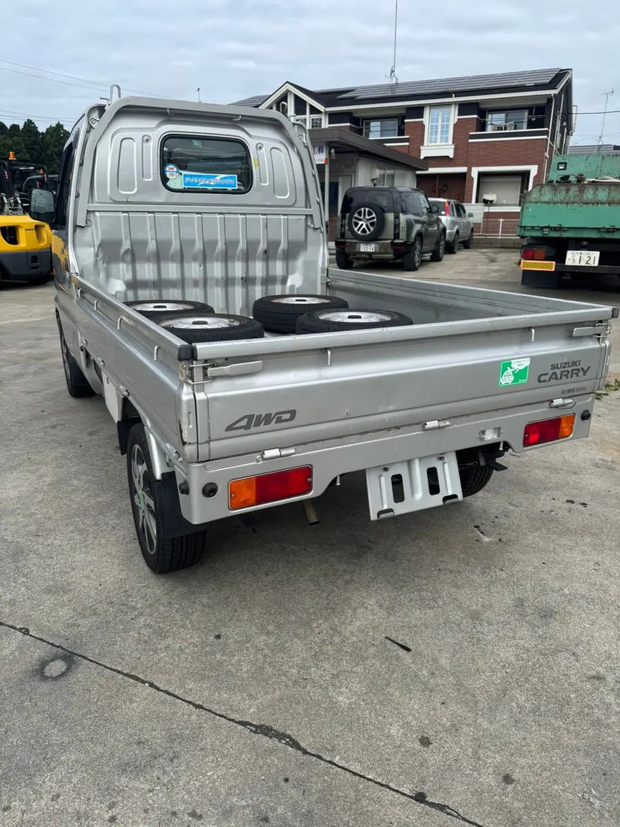 2001 Suzuki Carry 4x4, a silver Kei Truck, for sale at Skyline Kei Trucks in Houston, TX (photo 5 of 12)