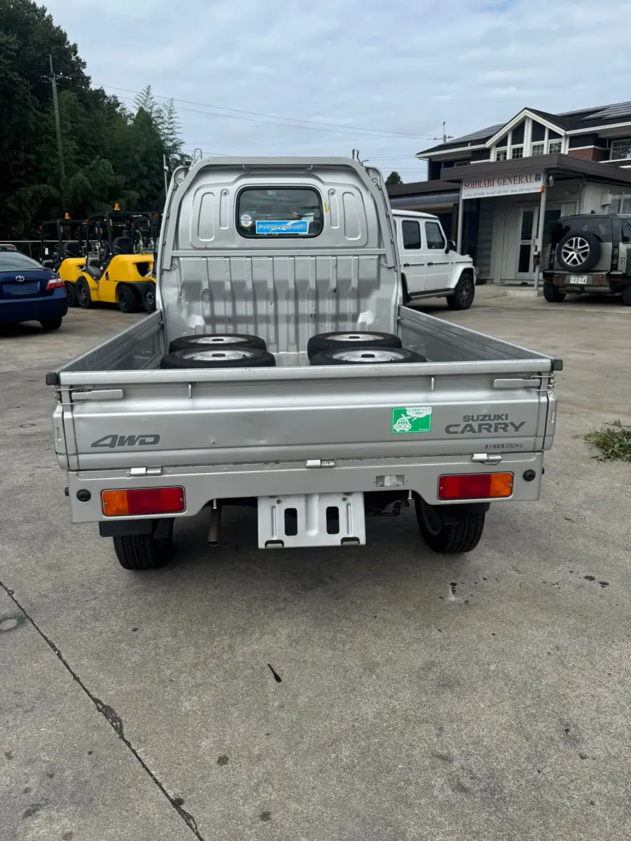 2001 Suzuki Carry 4x4, a silver Kei Truck, for sale at Skyline Kei Trucks in Houston, TX (photo 6 of 12)
