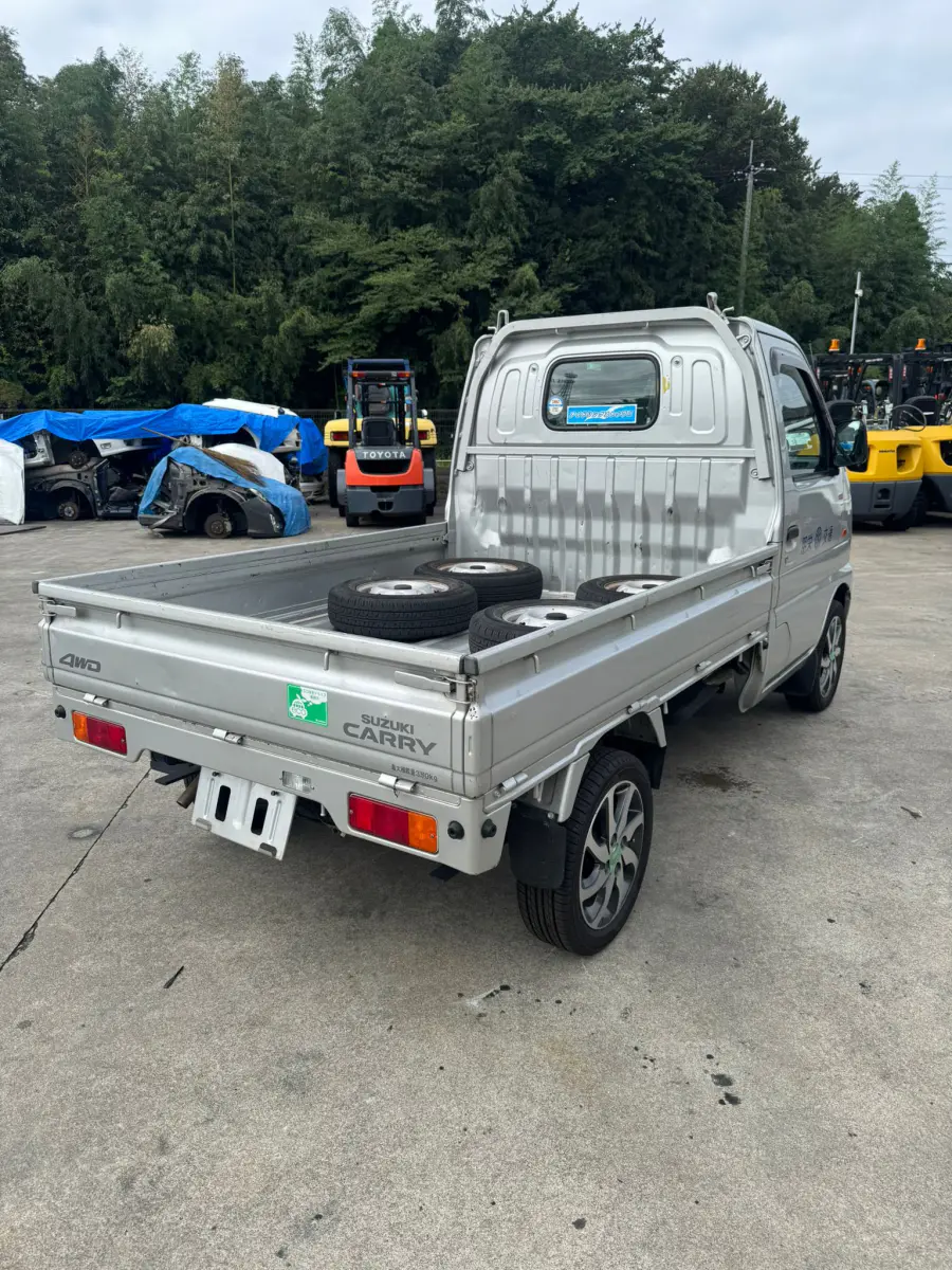 2001 Suzuki Carry 4x4, a silver Kei Truck, for sale at Skyline Kei Trucks in Houston, TX (photo 7 of 12)