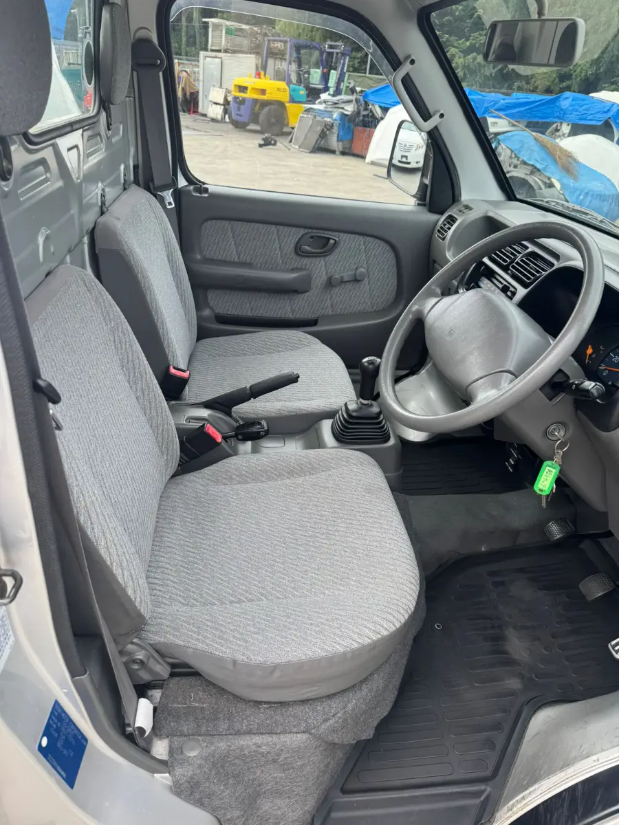 2001 Suzuki Carry 4x4, a silver Kei Truck, for sale at Skyline Kei Trucks in Houston, TX (photo 8 of 12)