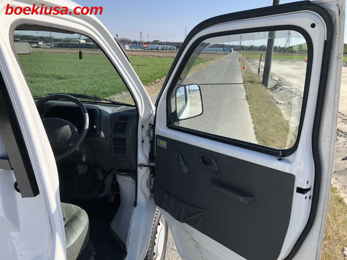 2001 Suzuki Carry 4x4, a white Kei Truck, for sale at Boeki USA in Paterson, NJ (photo 12 of 20)