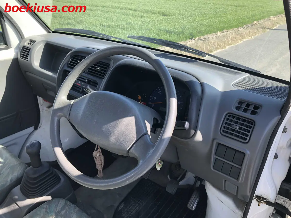 2001 Suzuki Carry 4x4, a white Kei Truck, for sale at Boeki USA in Paterson, NJ (photo 13 of 20)