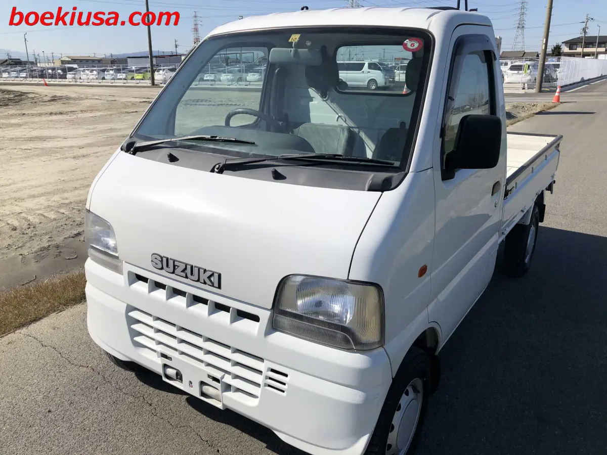 2001 Suzuki Carry 4x4, a white Kei Truck, for sale at Boeki USA in Paterson, NJ (photo 2 of 20)