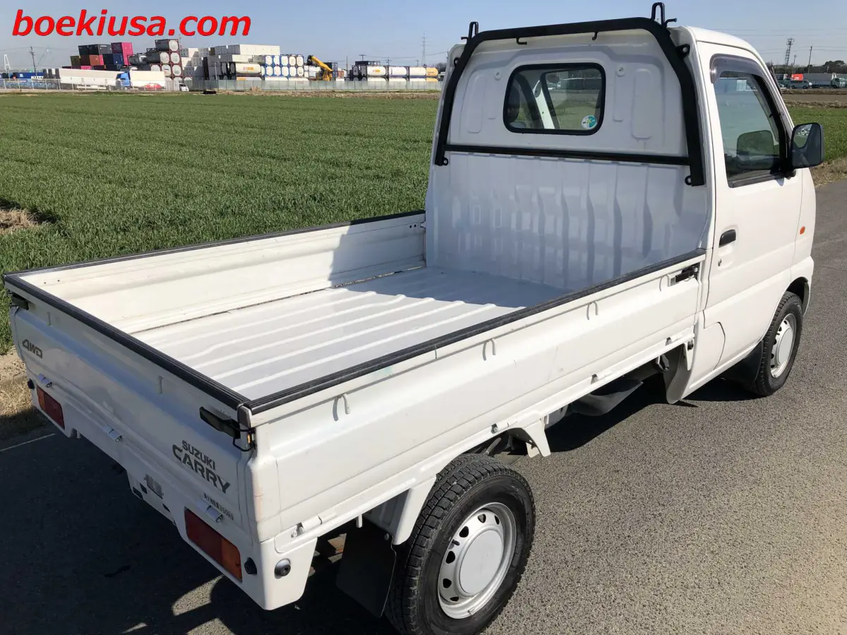 2001 Suzuki Carry 4x4, a white Kei Truck, for sale at Boeki USA in Paterson, NJ (photo 4 of 20)