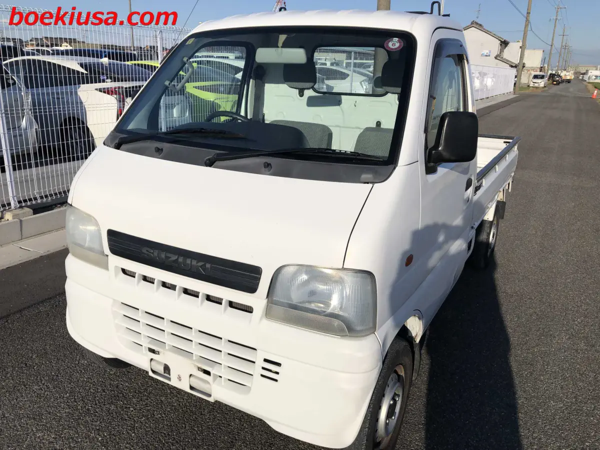 2001 Suzuki Carry 4x4, a white Kei Truck, for sale at Boeki USA in Paterson, NJ (photo 2 of 20)