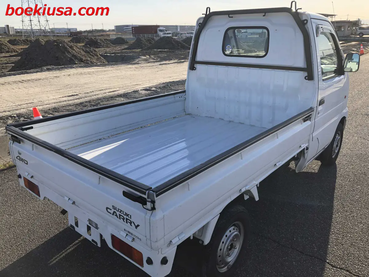 2001 Suzuki Carry 4x4, a white Kei Truck, for sale at Boeki USA in Paterson, NJ (photo 4 of 20)