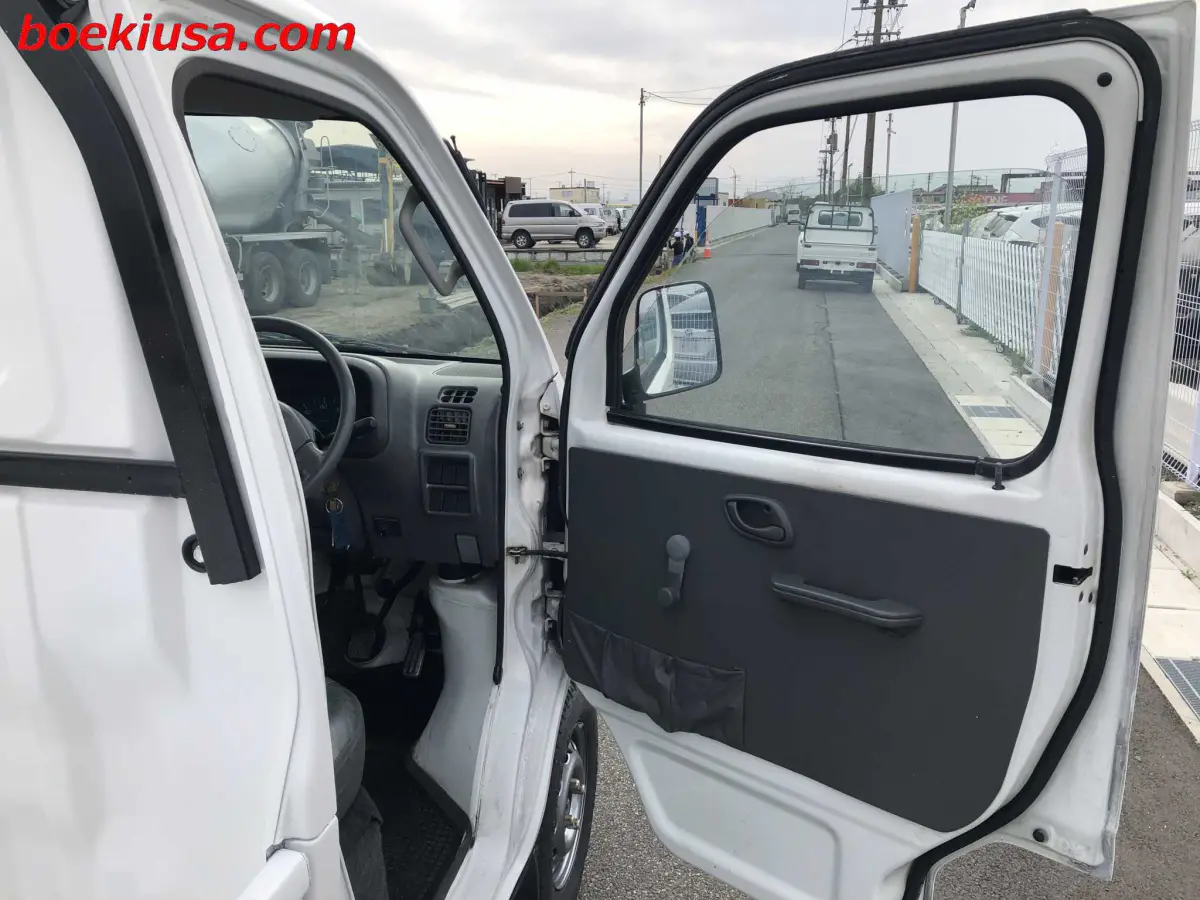 2001 Suzuki Carry 4x4, a white Kei Truck, for sale at Boeki USA in Paterson, NJ (photo 12 of 20)