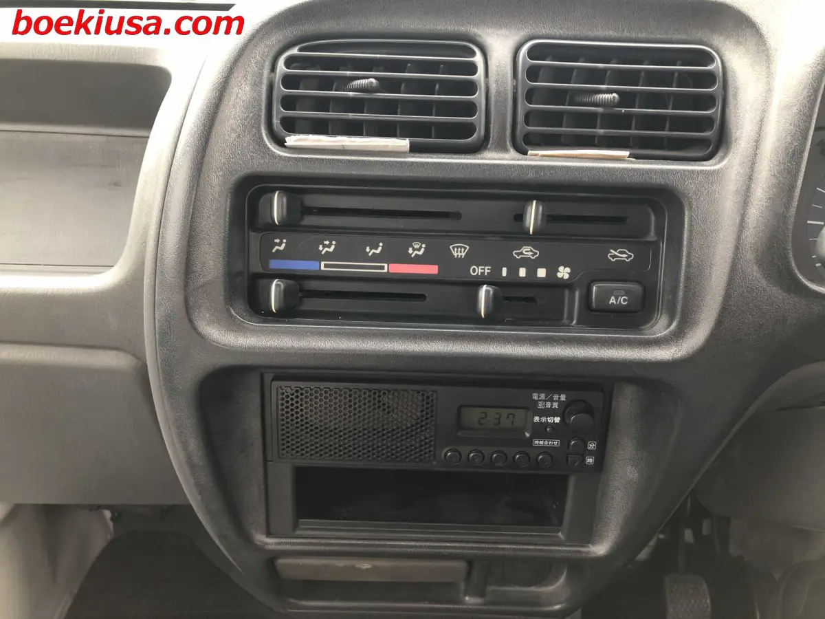 2001 Suzuki Carry 4x4, a white Kei Truck, for sale at Boeki USA in Paterson, NJ (photo 17 of 20)