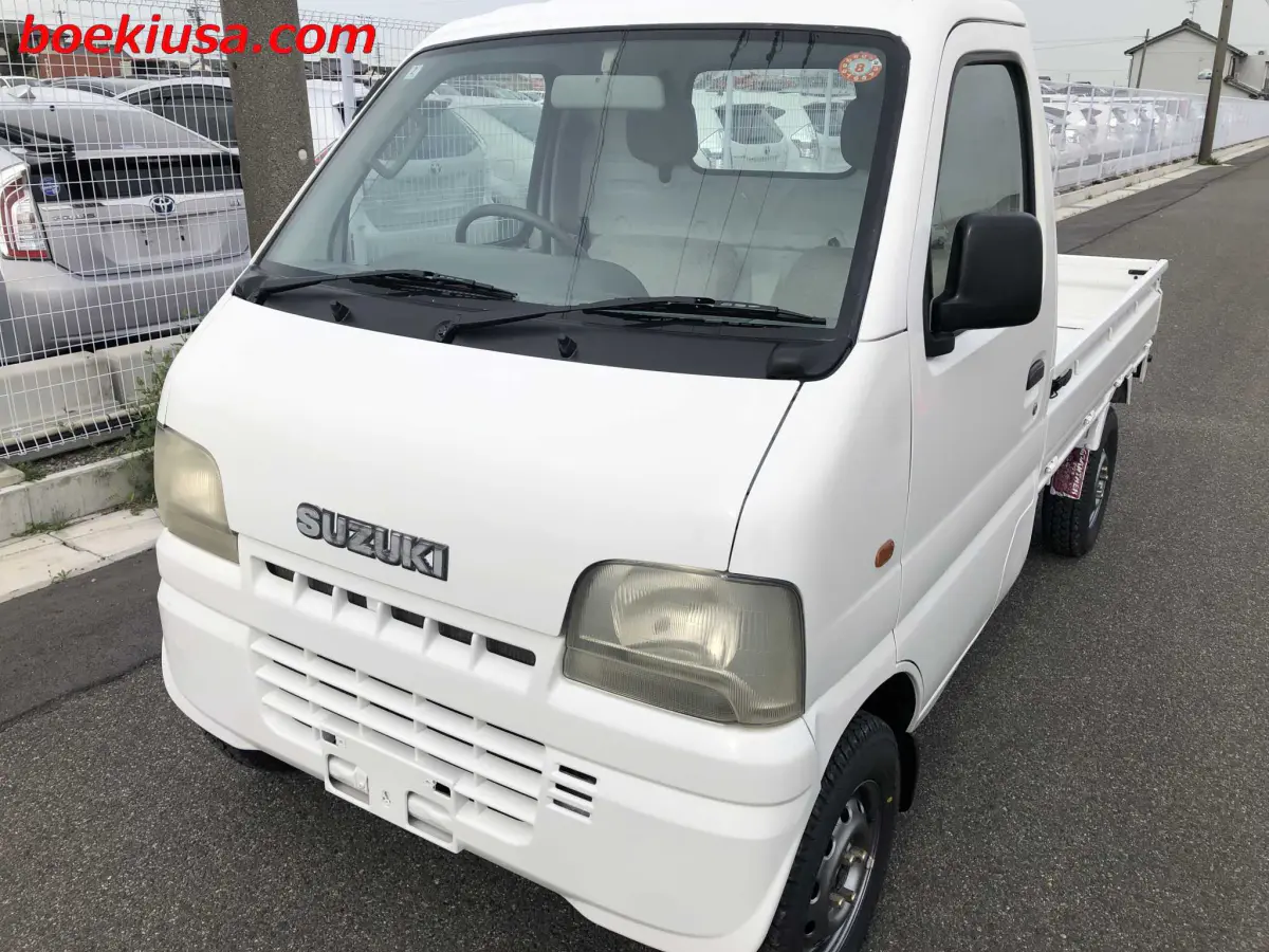 2001 Suzuki Carry 4x4, a white Kei Truck, for sale at Boeki USA in Paterson, NJ (photo 2 of 20)