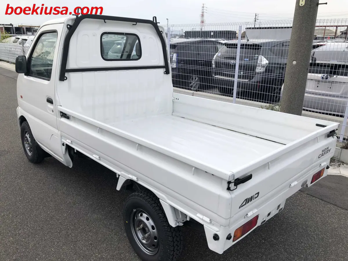 2001 Suzuki Carry 4x4, a white Kei Truck, for sale at Boeki USA in Paterson, NJ (photo 3 of 20)