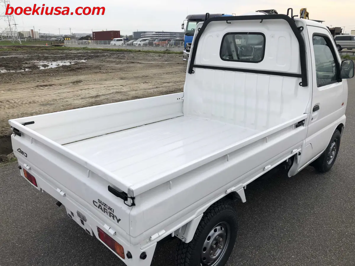 2001 Suzuki Carry 4x4, a white Kei Truck, for sale at Boeki USA in Paterson, NJ (photo 4 of 20)