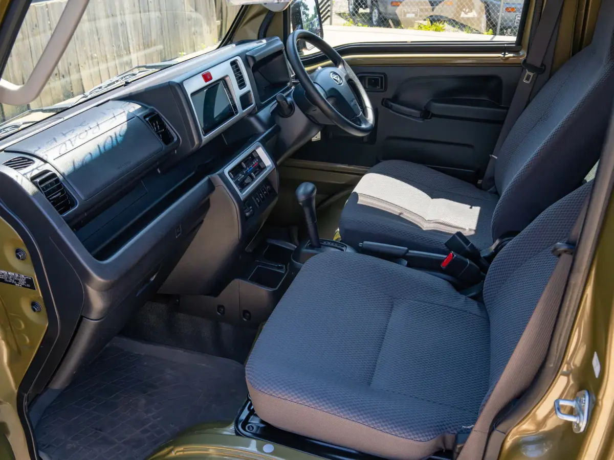 2021 Daihatsu Hijet, a green off-road Kei Truck, for sale at Japan Direct Motors in Irmo, SC (photo 11 of 16)