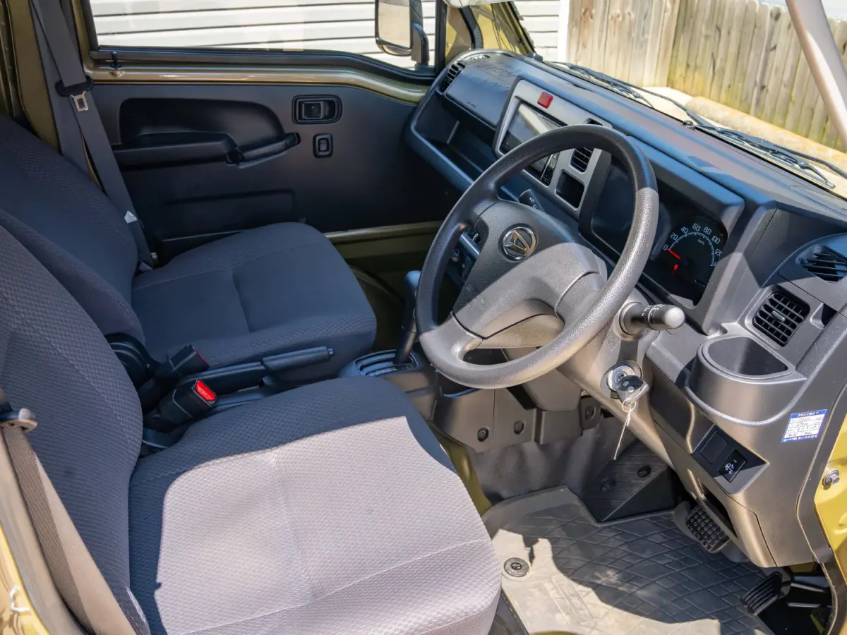 2021 Daihatsu Hijet, a green off-road Kei Truck, for sale at Japan Direct Motors in Irmo, SC (photo 12 of 16)