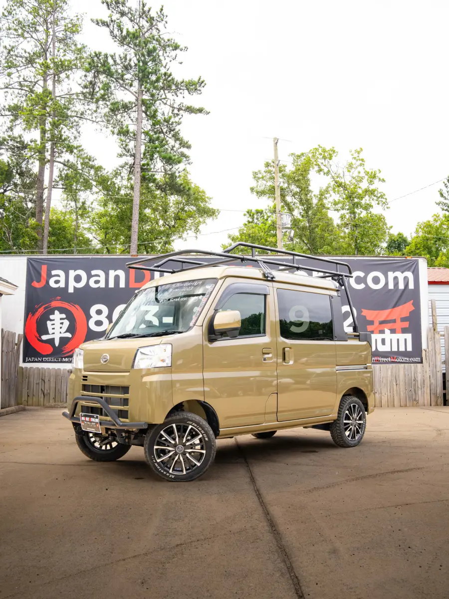 2023 Daihatsu Hijet Deckvan, a green off-road Kei Truck, for sale at Japan Direct Motors in Irmo, SC (photo 1 of 21)