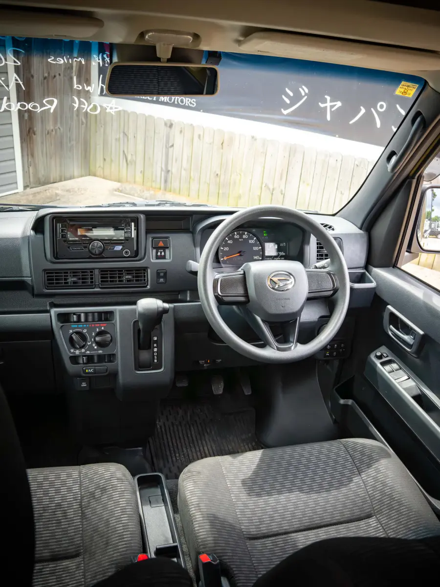 2023 Daihatsu Hijet Deckvan, a green off-road Kei Truck, for sale at Japan Direct Motors in Irmo, SC (photo 11 of 21)