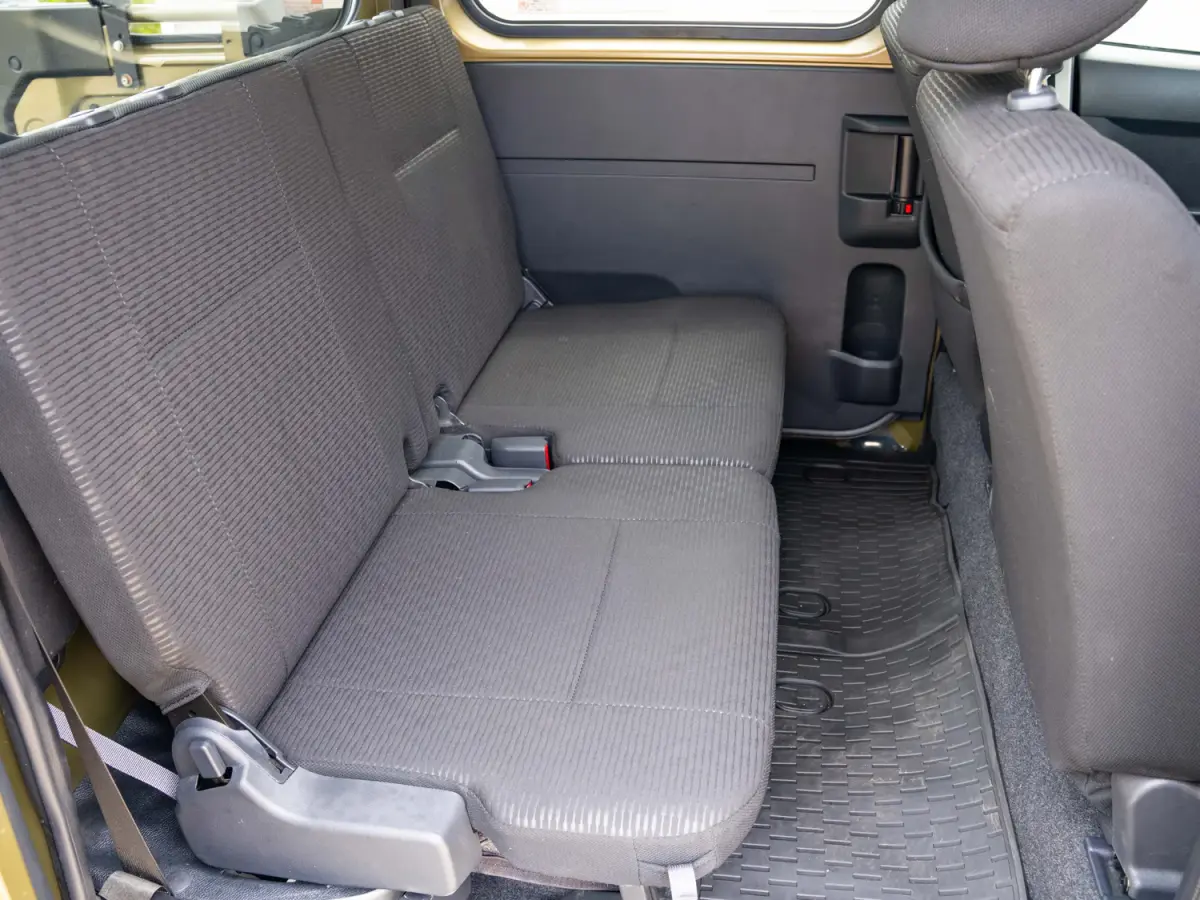 2023 Daihatsu Hijet Deckvan, a green off-road Kei Truck, for sale at Japan Direct Motors in Irmo, SC (photo 16 of 21)