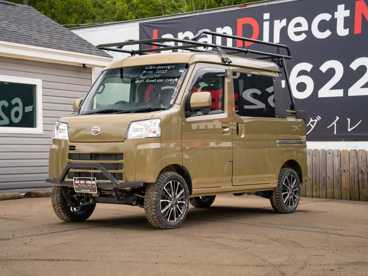 2023 Daihatsu Hijet Deckvan, a green off-road Kei Truck, for sale at Japan Direct Motors in Irmo, SC (photo 3 of 21)