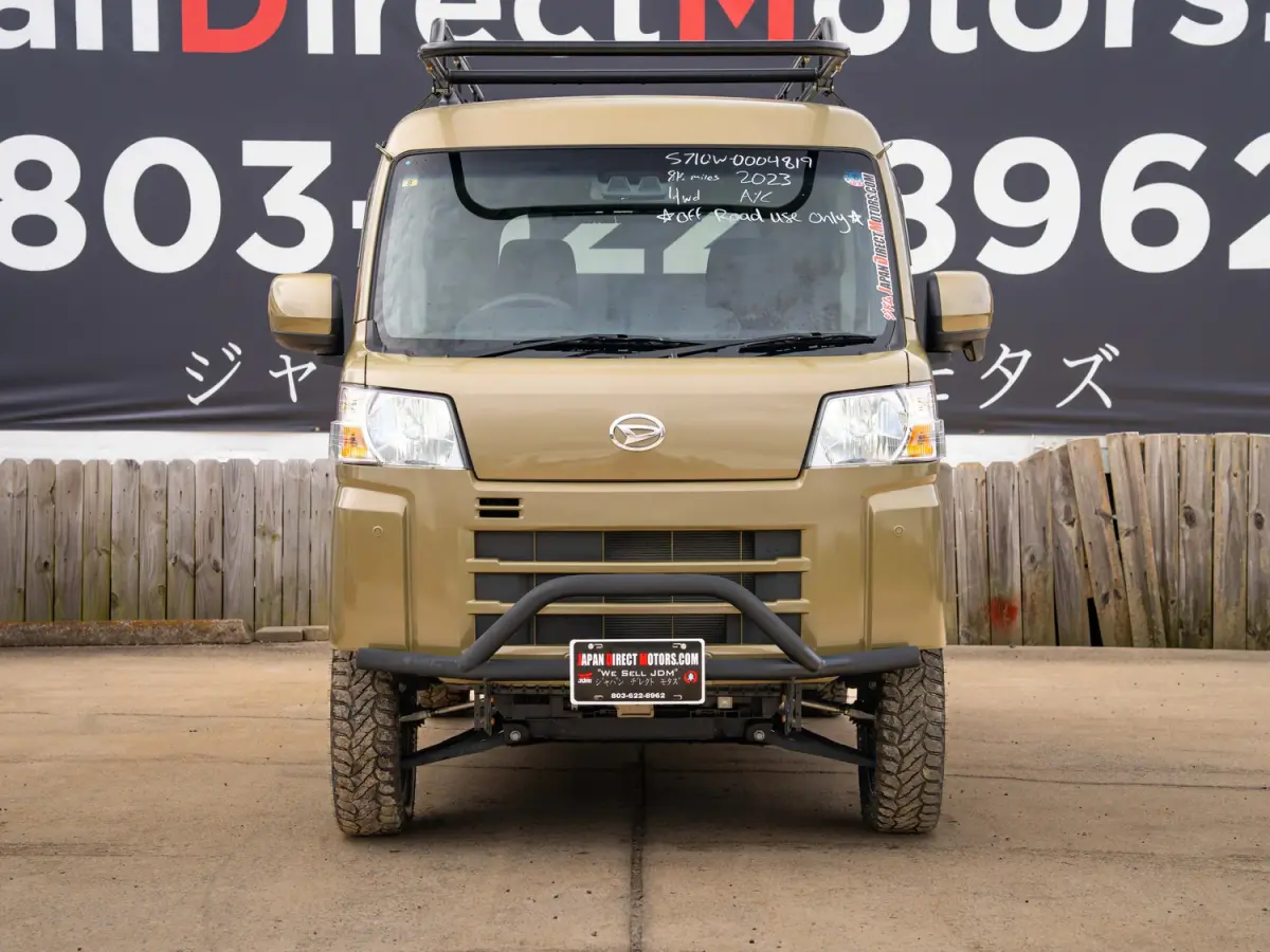 2023 Daihatsu Hijet Deckvan, a green off-road Kei Truck, for sale at Japan Direct Motors in Irmo, SC (photo 4 of 21)