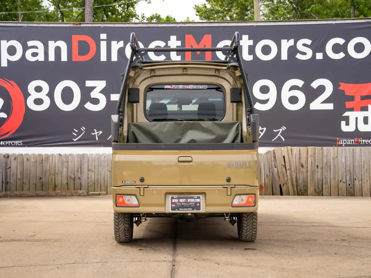 2023 Daihatsu Hijet Deckvan, a green off-road Kei Truck, for sale at Japan Direct Motors in Irmo, SC (photo 8 of 21)