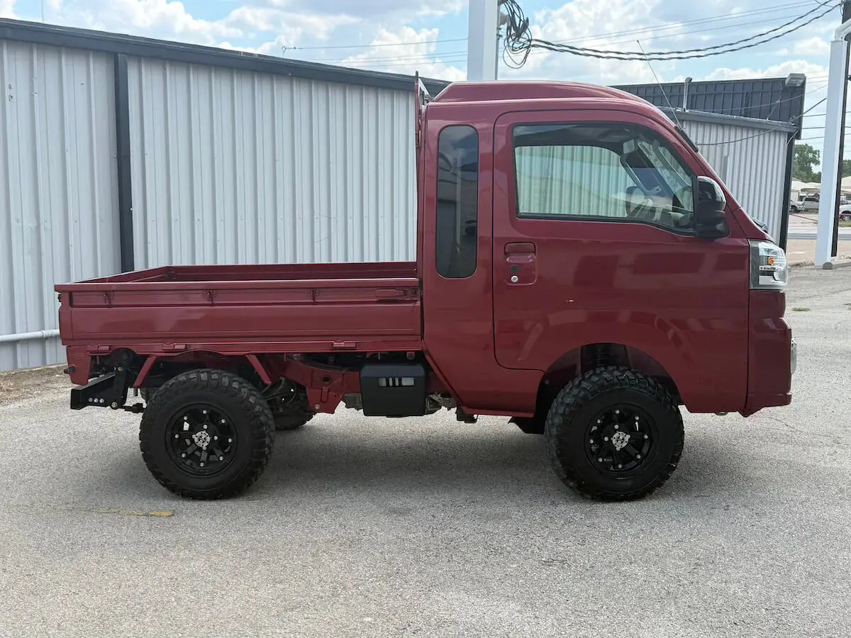 2023 Daihatsu Hijet Jumbo Cab, a red off-road Kei Truck, for sale at Weatherford Mini Trucks in Weatherford, TX (photo 2 of 14)