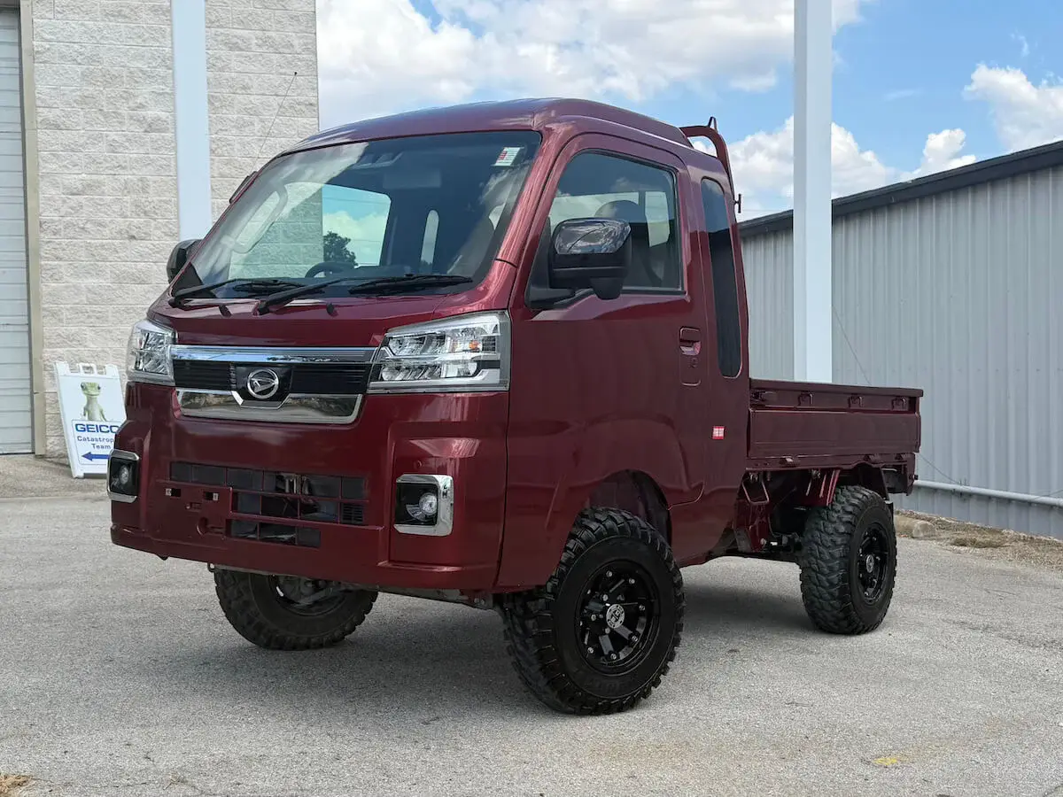2023 Daihatsu Hijet Jumbo Cab, a red off-road Kei Truck, for sale at Weatherford Mini Trucks in Weatherford, TX (photo 4 of 14)