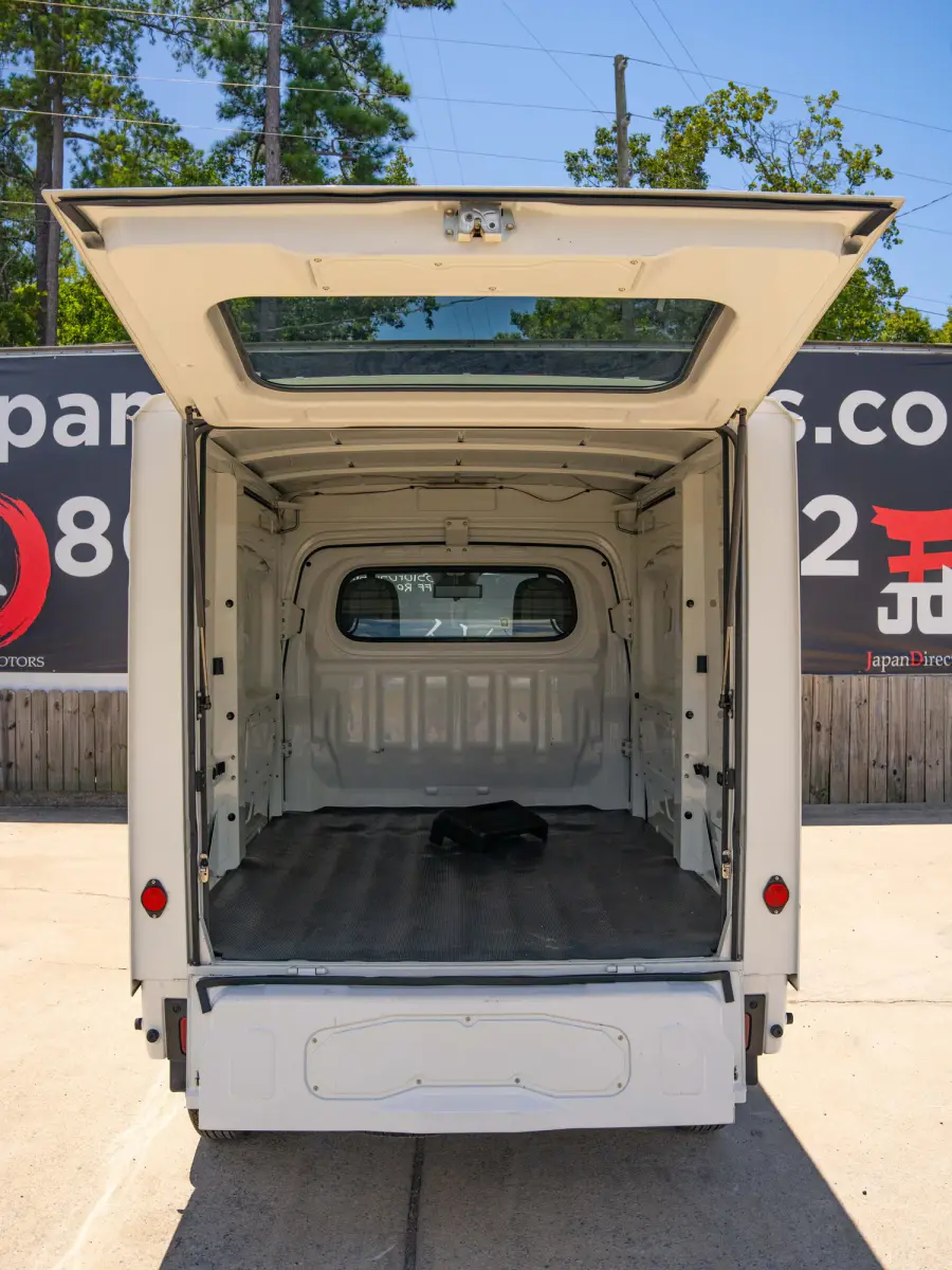 2023 Daihatsu Hijet, a black off-road Kei Truck, for sale at Japan Direct Motors in Irmo, SC (photo 11 of 19)