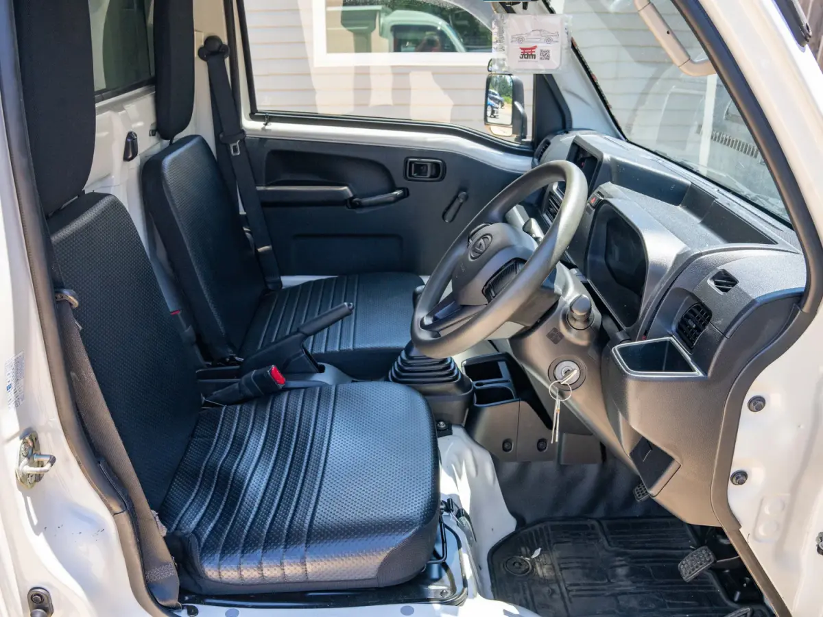 2023 Daihatsu Hijet, a black off-road Kei Truck, for sale at Japan Direct Motors in Irmo, SC (photo 14 of 19)