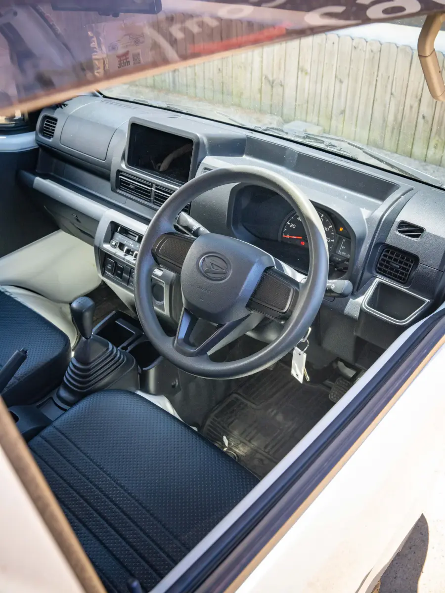 2023 Daihatsu Hijet, a black off-road Kei Truck, for sale at Japan Direct Motors in Irmo, SC (photo 15 of 19)