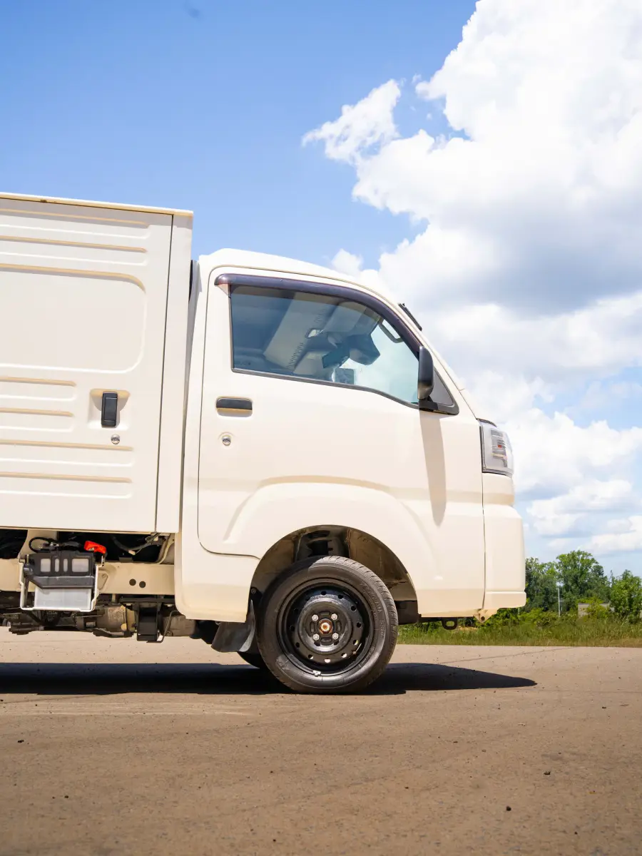 2023 Daihatsu Hijet, a black off-road Kei Truck, for sale at Japan Direct Motors in Irmo, SC (photo 17 of 19)